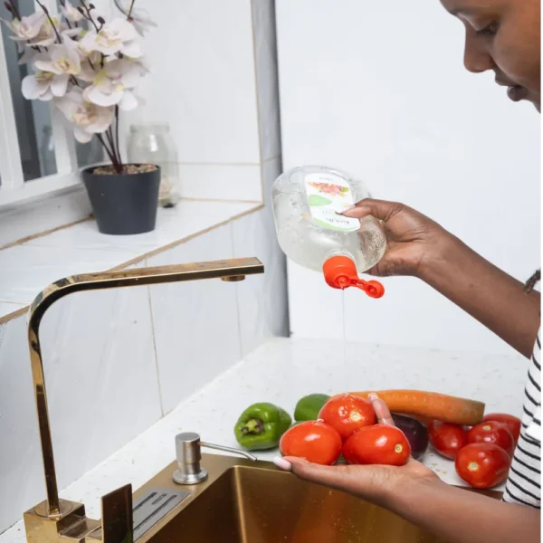 Washing apples with Kaik Veggie Wash