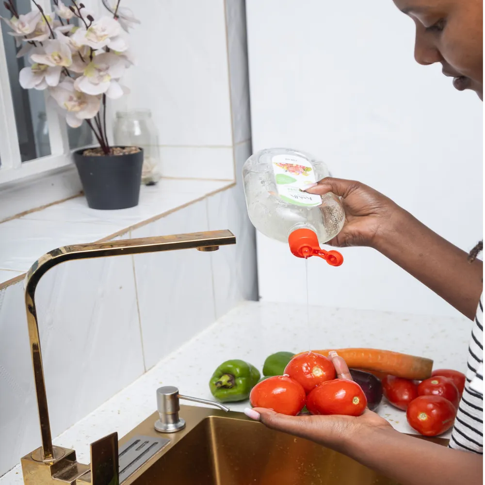 Washing apples with Kaik Veggie Wash